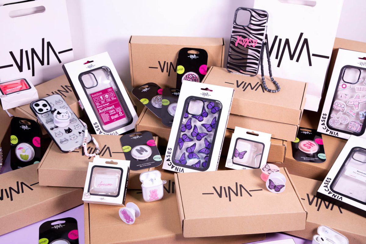 several iphone cases and airpods cases with packages and boxes